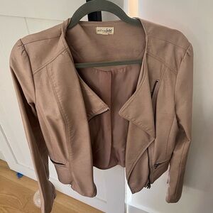 Light pink leather jacket with ruffles on back